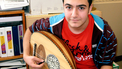 Student with cultural musical instrument